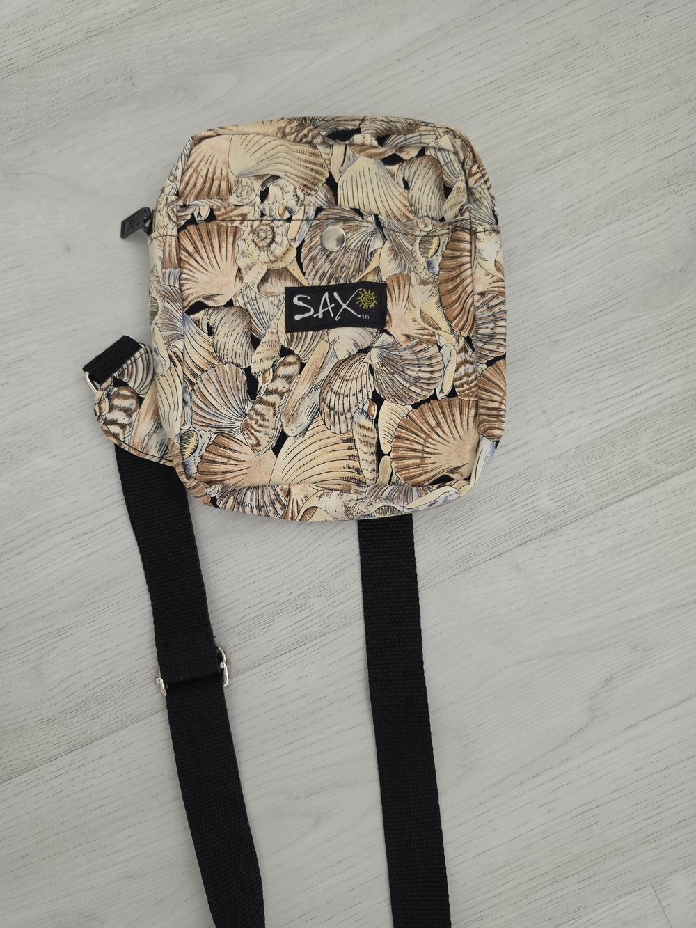 Saxx Seashell Print Crossbody Bag in Beige and Black